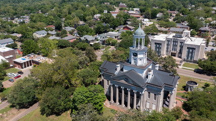 Vicksburg, Mississippi, USA - April 23, 2024: Afternoon sun shines on the historic downtown...