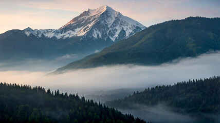 A majestic mountain range with snowcapped peaks and lush green valleys stretching endlessly