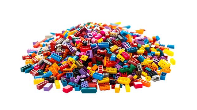 Pile of multi colored plastic pieces isolated on transparent background