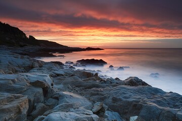 sunset over a rocky coast