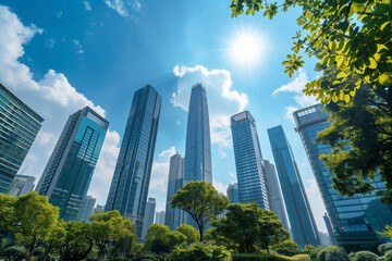 Obraz premium Skyscrapers Viewed from Below with Blue Sky and White Clouds