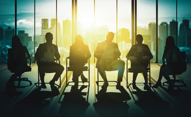 Double exposure image of many business people conference group meeting on city office building in background showing partnership success of business deal. Concept of teamwork, trust and agreement. uds