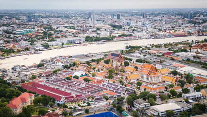 aerial of Bangkok Thailand Grand palace king royal residence in old town drone cityscape at sunset