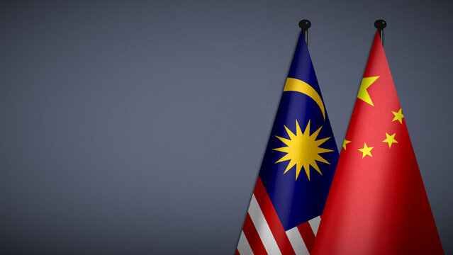 3D rendering of two flag from Malaysia and China on flagpoles with Gray background for diplomatic. bilateral relations. peace and conflict between countries. Fabric