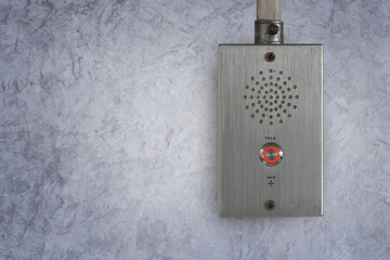 Train control panel with emergency call button.