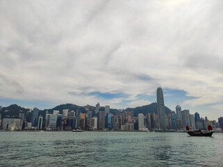 Fototapeta premium View of Victoria harbor from Avenue of Stars, Hong Kong during the day.