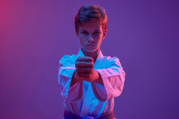 A Young Taekwondo Practitioner's Focused Gaze in a Studio