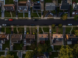 Aerial view of the houses in a residential neighborhood in Valley Stream at sunset in New York, USA