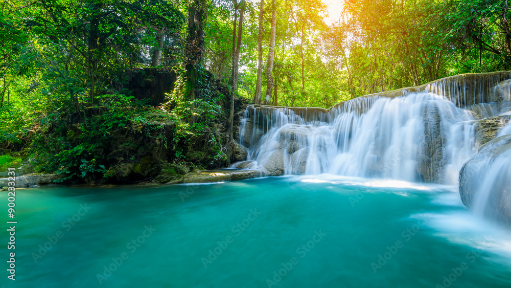 Wall mural Beauty in nature, amazing waterfall in tropical forest of national park, Thailand