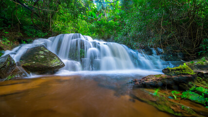 Beauty in nature, amazing waterfall in tropical forest of national park, Thailand