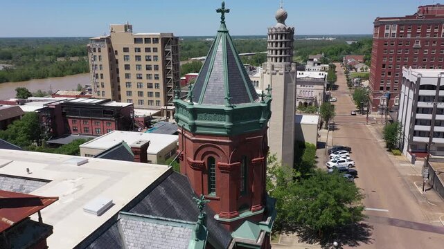 Vicksburg, Mississippi, USA - April 23, 2024: Afternoon sun shines on the historic buildings of downtown Vicksburg.