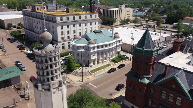 Vicksburg, Mississippi, USA - April 23, 2024: Afternoon sun shines on the historic buildings of downtown Vicksburg.