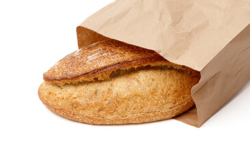 Loaf of bread in a paper bag isolated white background