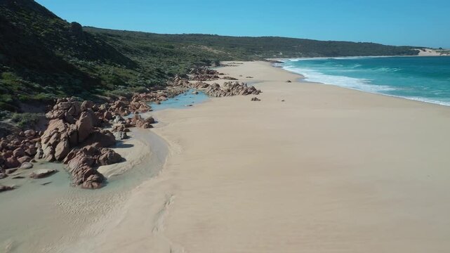 Drone footage of Injidup Beach near Yallingup town on a sunny day in Western Australia, Australia