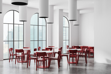 Modern cafe interior with red chairs and round tables. 3D Rendering