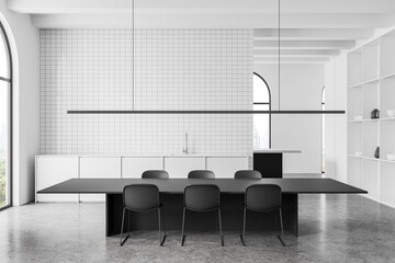 White home kitchen interior with dining table and cabinet, panoramic window