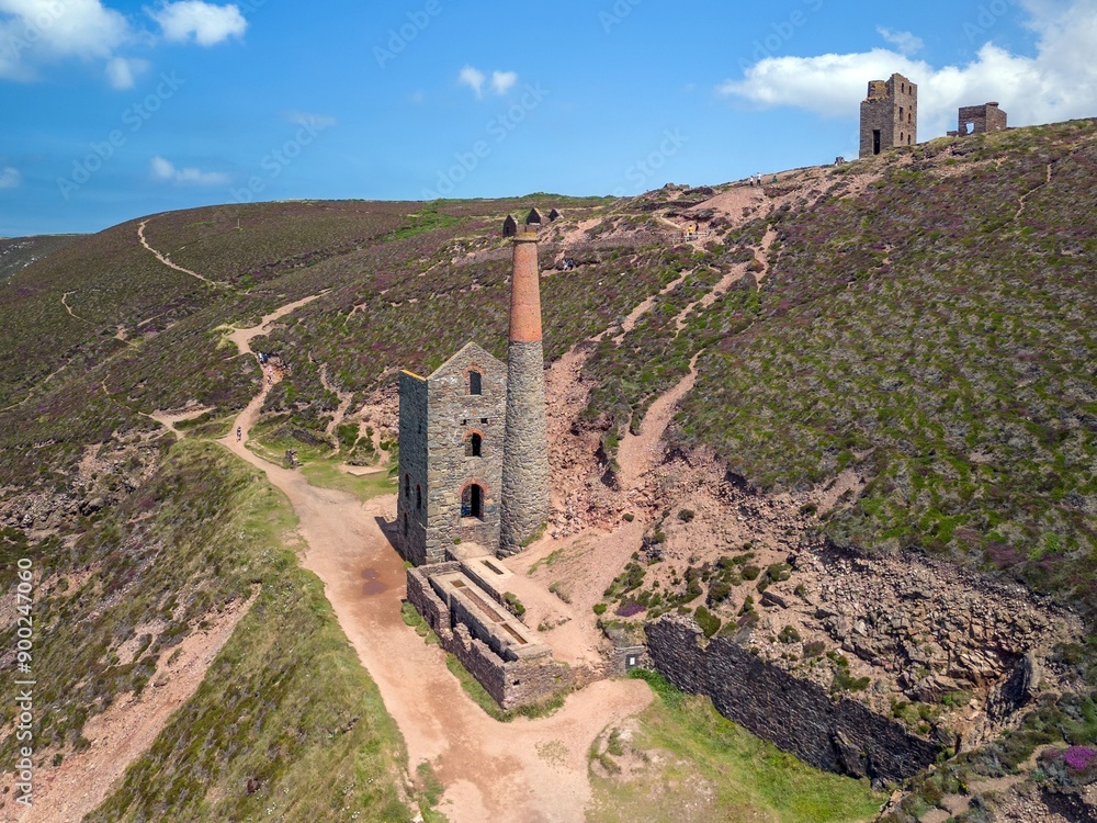 Sticker aerial view of the historic mine buildings of st agnes on the rugged coastline of cornwall, england