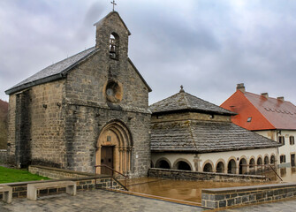 Fototapeta premium Charlemagne's silo and the 13th century Gothic church of Santiago in Roncesvalles. Navarre, Spain.