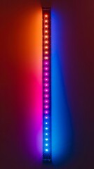 Obraz premium A red blue and purple light strip on a wall