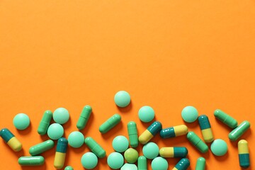 Different pills on a color background