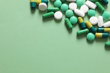 Pills in blisters on a colored background