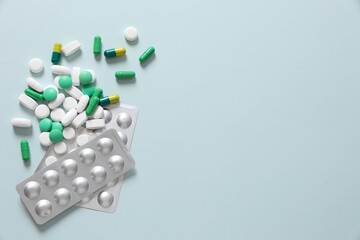 Different pills on a color background