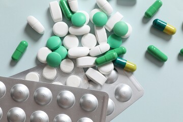 Different pills on a color background