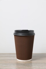 Paper cups of coffee on the table