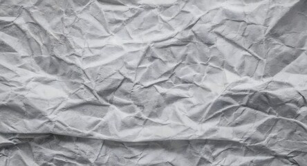 Obraz premium A crinkled paper texture with prominent, irregular folds and creases, and a worn, used look. Multiple variations available 