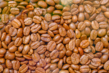 Close-up of roasted coffee beans. background