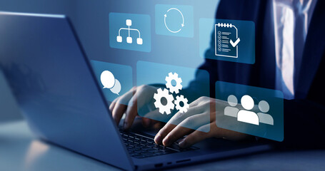 Businessman who works at laptop for technology development.Develop efficiency of business process...