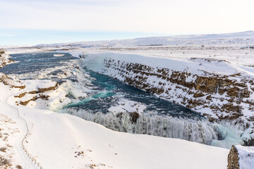 Picturesque snowy Gullfoss waterfall in the cold Icelandic winter
