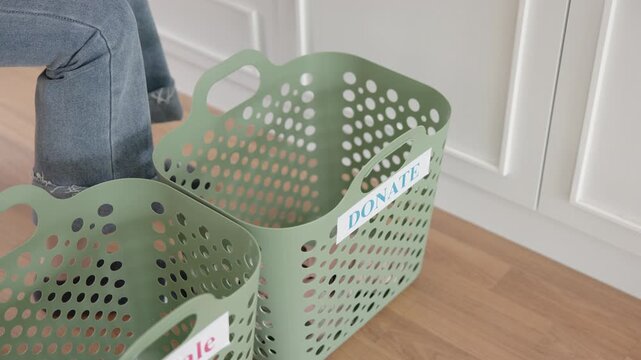 Young adult woman asia people arrange stack undies sale manage used old bra bank neat basket box clean house closet eco care. Happy asian smile go green wife home chores net zero waste fabric issue.