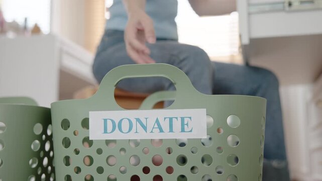 Young adult woman asia people arrange stack undies sale manage used old bra bank neat basket box clean house closet eco care. Happy asian smile go green wife home chores net zero waste fabric issue.