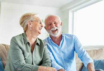 woman laptop man computer technology retirement senior adult couple home female wife husband internet male smiling elderly happy together mature old