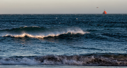 rescue at sea. maritime rescue. ship and helicopter.