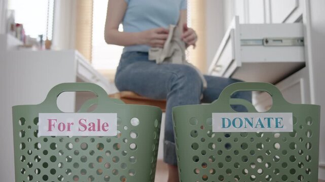 Young adult woman asia people arrange stack undies sale manage used old bra bank neat basket box clean house closet eco care. Happy asian smile go green wife home chores net zero waste fabric issue.