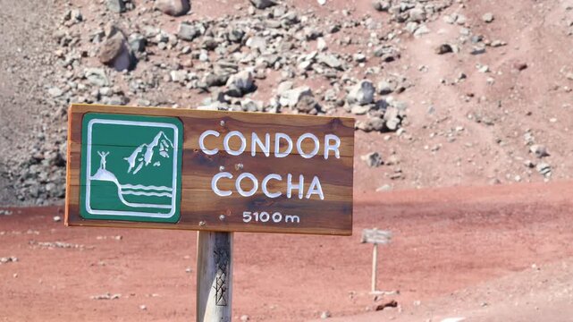 Sign of Condor Cocha Lagoon at 5100 meters on Chimborazo Volcano in Ecuador, maximum ascent limit