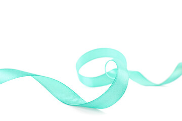 One beautiful turquoise ribbon isolated on white
