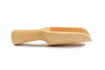 Wooden scoop close up on white background.