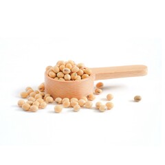 Soybean seeds in wooden spoons close up on white background.