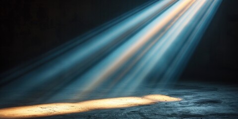 A spotlight shines on a dark floor