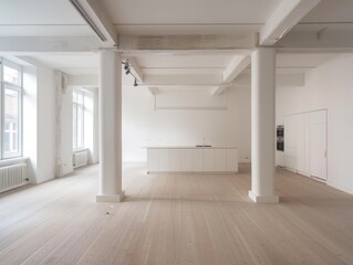 Obraz premium A large, empty room with white walls and wooden floors. The room is open and has a clean, minimalist feel