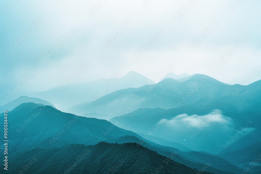 Aufkleber aerial view of a mountain range with peaks and valleys visible