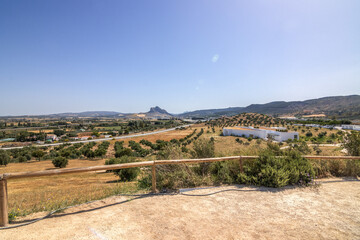 The Site of the Antequera dolmens is a cultural asset made up of a series of three cultural monuments, Menga dolmen, Viera dolmen and El Romeral tholos, and two natural monuments.