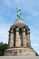 Hermannsdenkmal in Gemany, bronze statue of cherusci war chief Arminius or Hermann in German standing tall on stone pedestal