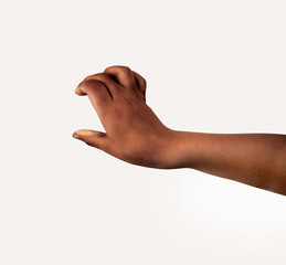 Child hand holding some like a blank object isolated on a white background