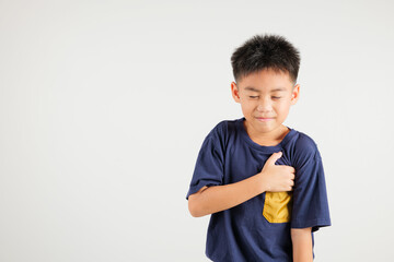 Young kid boy pressing on chest pain isolated on white background, painful expression heartache, primary children having heart attack heart disease, Painful cramps problem