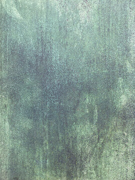 Oxidized rusty metal with blue and green copper patina 