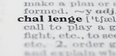 Challenge definition in the dictionary close-up, shallow depth of field and selective focus.